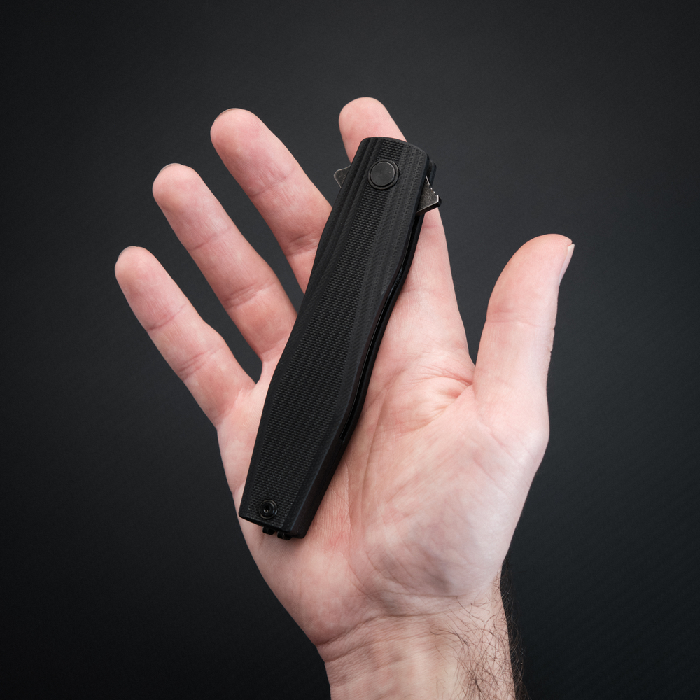 Нож складной туристический Ruike P188-B, (9.1 см) D2 / G10 черный